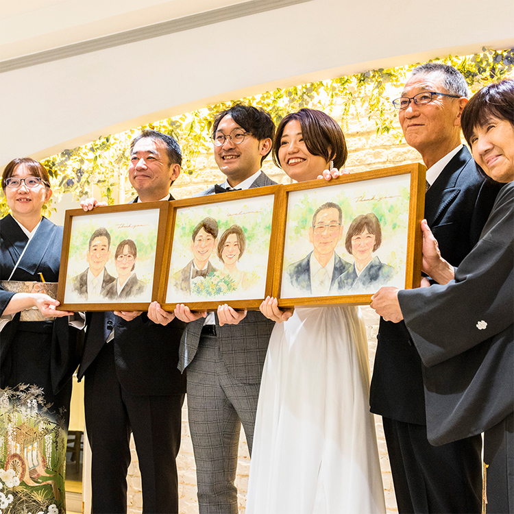 結婚式でご両親へのプレゼントなら似顔絵のWORLD1（ワールドワン）