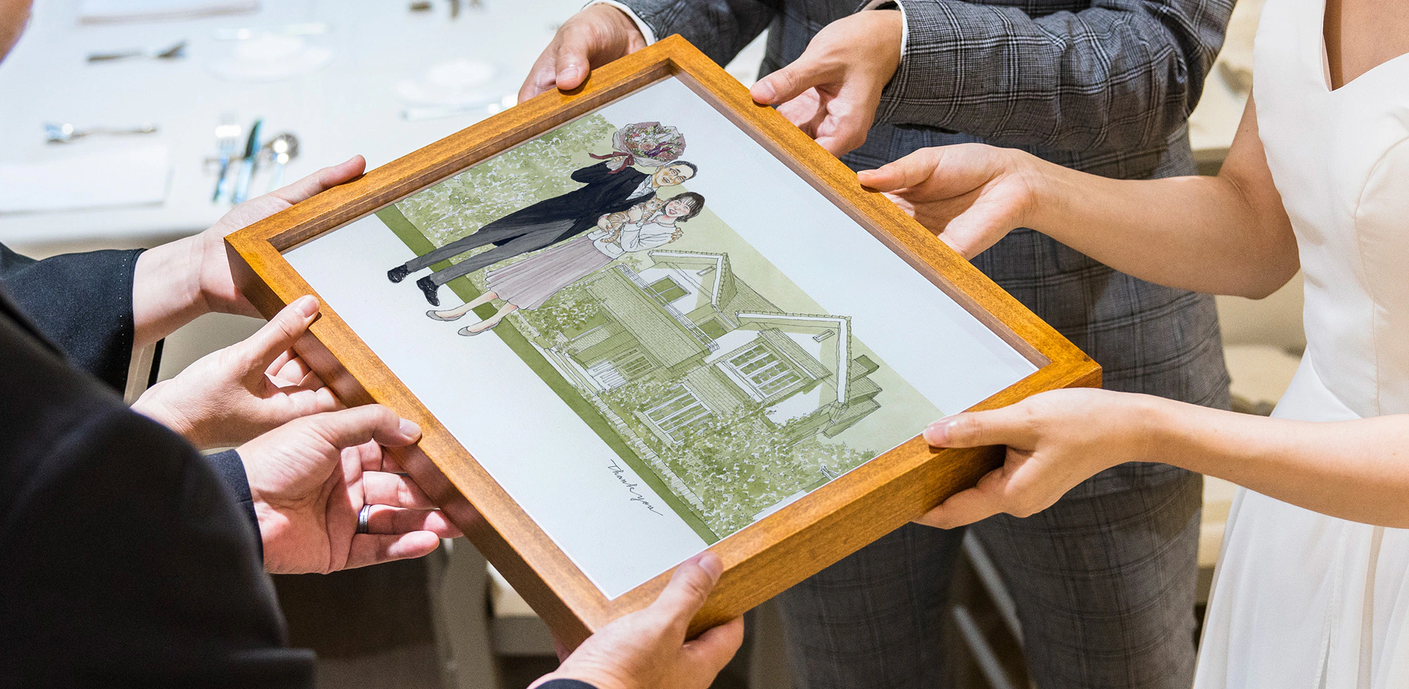 ご両親贈呈品の似顔絵